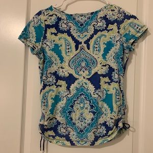Women’s blue and green shirt